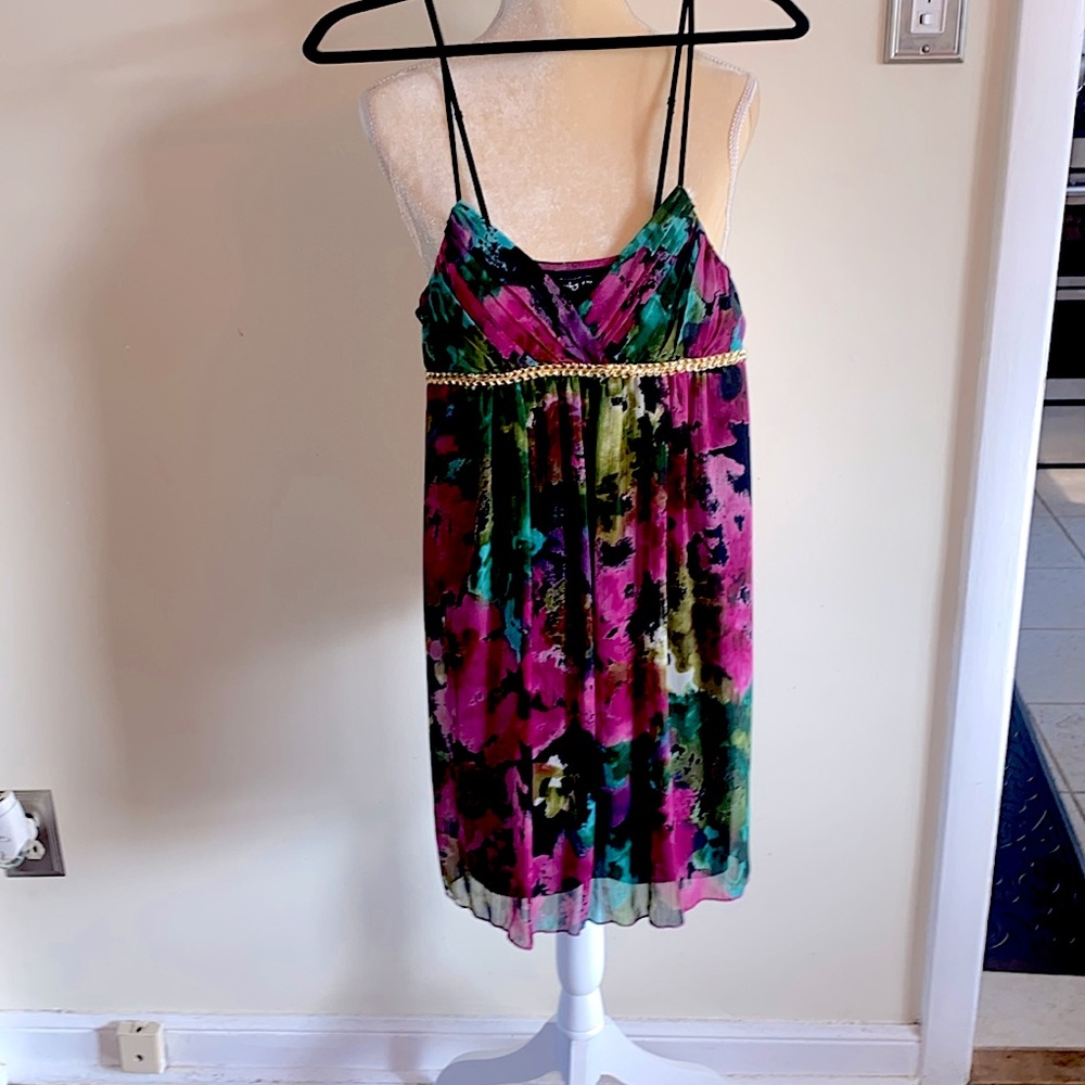 Floral junior dress from ruby rox with gold around the top.